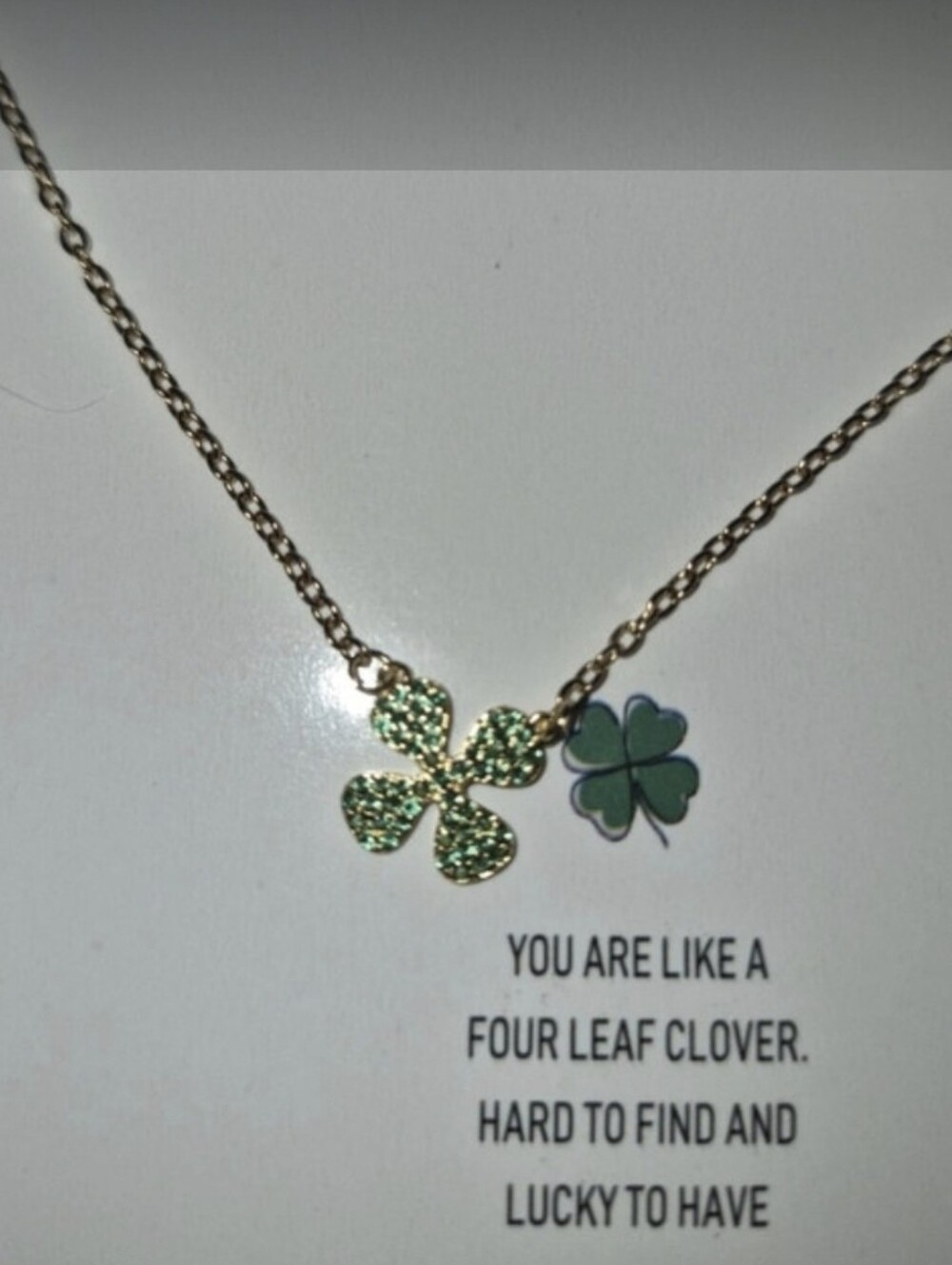 Plunder Gold-Tone Necklace with Green Glitter Four-Leaf Clover Pendant